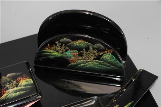 A Chinese Fuzhou (Foochow) lacquer desk set, mid 20th century, the blotter pad holder 45cm wide